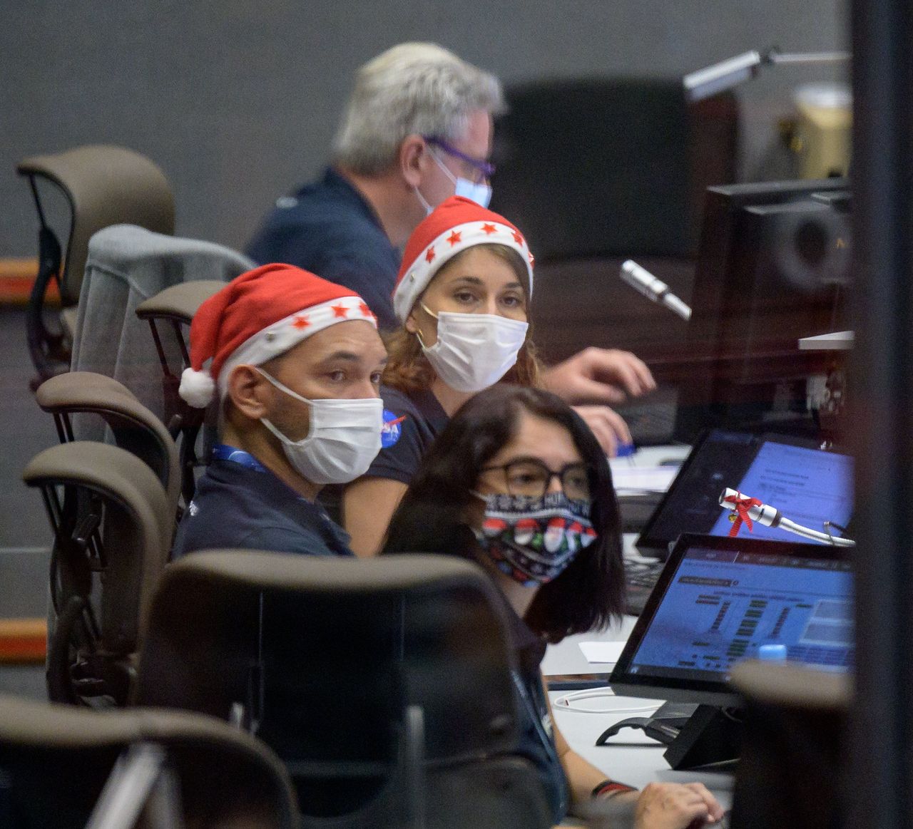Launch teams monitor the countdown to the launch of Arianespace's Ariane 5 rocket carrying NASA&rsquo;s James Webb Space Telescope, Saturday, Dec. 25, 2021, in the Jupiter Center at the Guiana Space Center in Kourou, French Guiana.