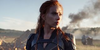 Natasha Romanoff/Black Widow (Scarlett Johansson) stares into the distance in Black Widow (2020)
