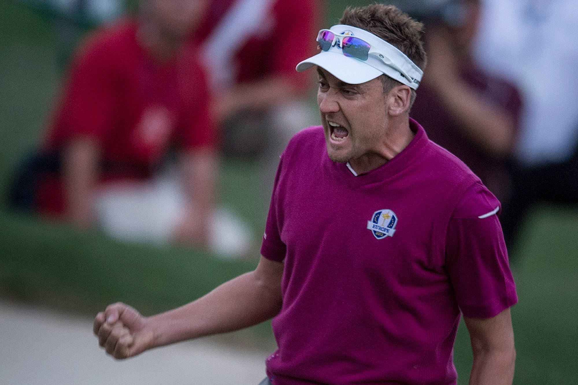Ian Poulter celebrating after winning his match on Saturday at the 2012 Ryder Cup