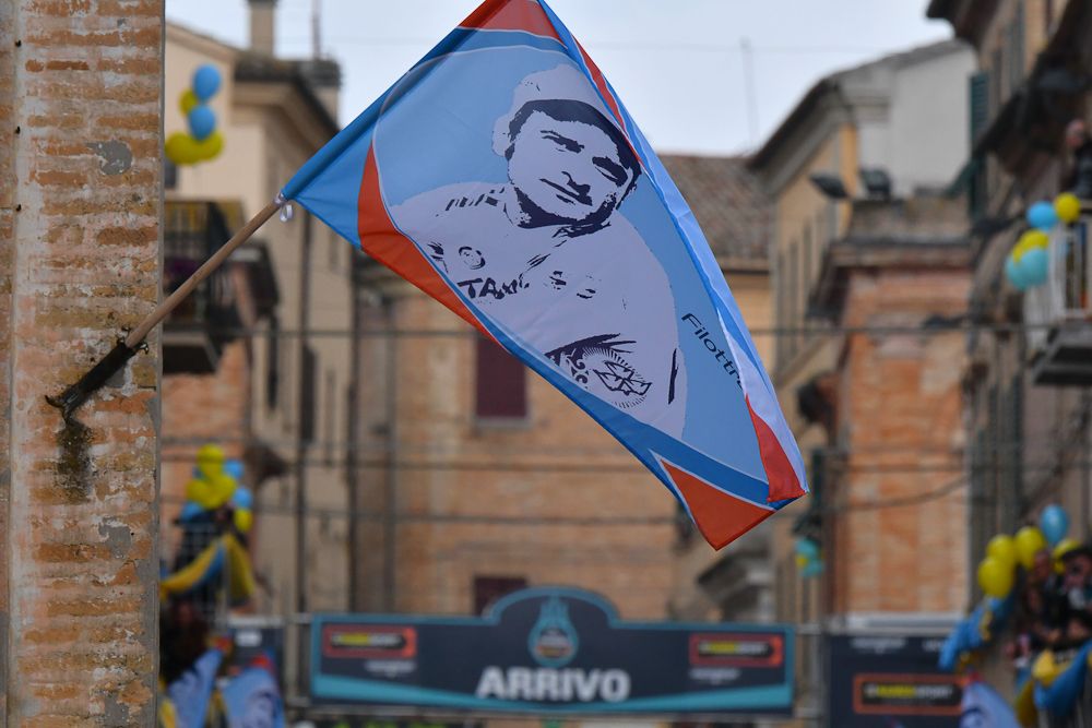A flag honouring Michele Scarponi flies in Filottrano
