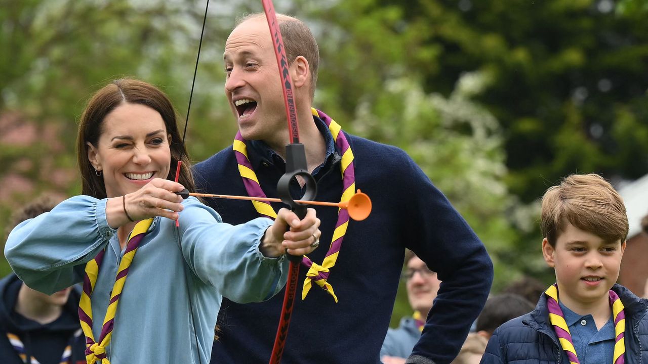 Kate Middleton, Prince William, and Prince George take part in archery at the Big Help Out on May 8, 2023.