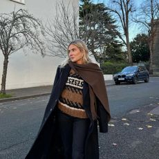 Lucy Williams in a fair isle sweater and scarf