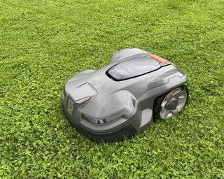 Husqvarna Automower 415X Robotic Lawn Mower being tested in writer's home