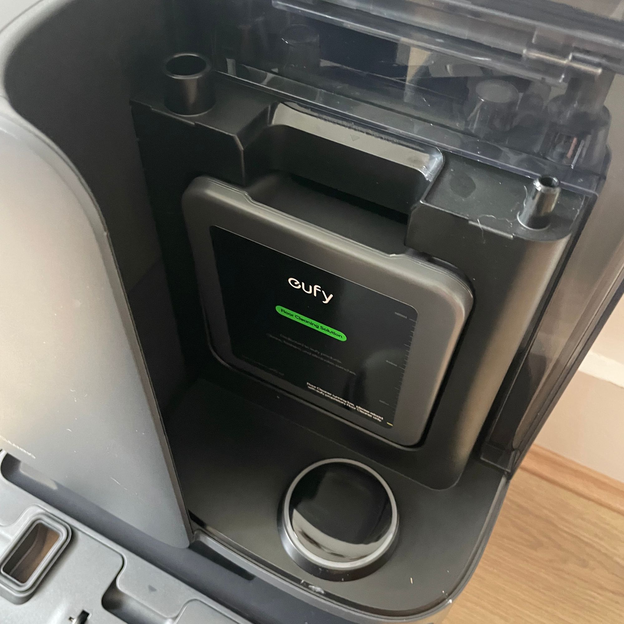 Close-up of the eufy cleaning solution in the Eufy Robot Vacuum Omni E25