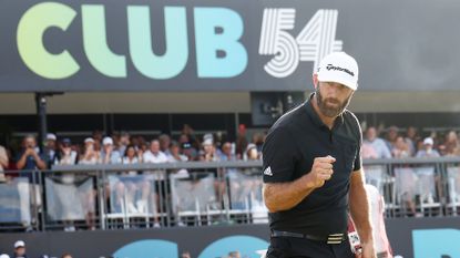 Dustin Johnson celebrates after holing the winning putt in the 2022 LIV Golf Championship at Trump National Doral