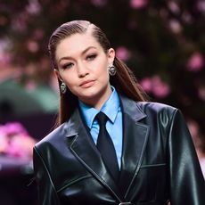 us model gigi hadid presents a creation for fashion house versace during the presentation of its womens and mens springsummer 2020 fashion collection in milan on june 15, 2019 photo by miguel medina afp photo credit should read miguel medinaafp via getty images