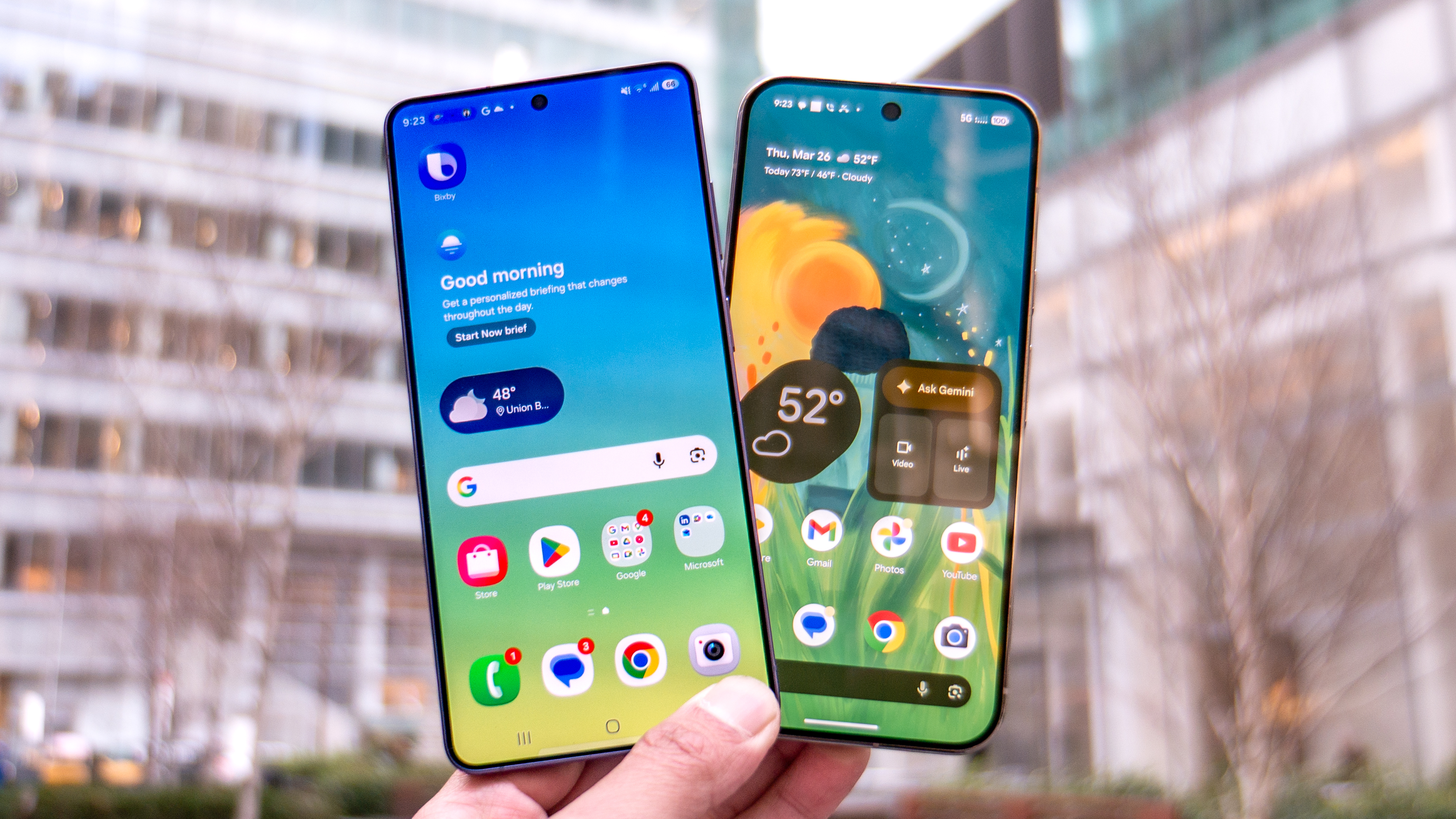 Galaxy S26 Ultra vs Pixel 10 Pro XL held in the hand.