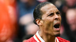 Virgil van Dijk celebrates after scoring a winner for Liverpool against West Ham at Anfield in the Premier League in April 2025.