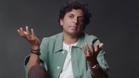 M. Night Shyamalan is shown during an interview with GQ.