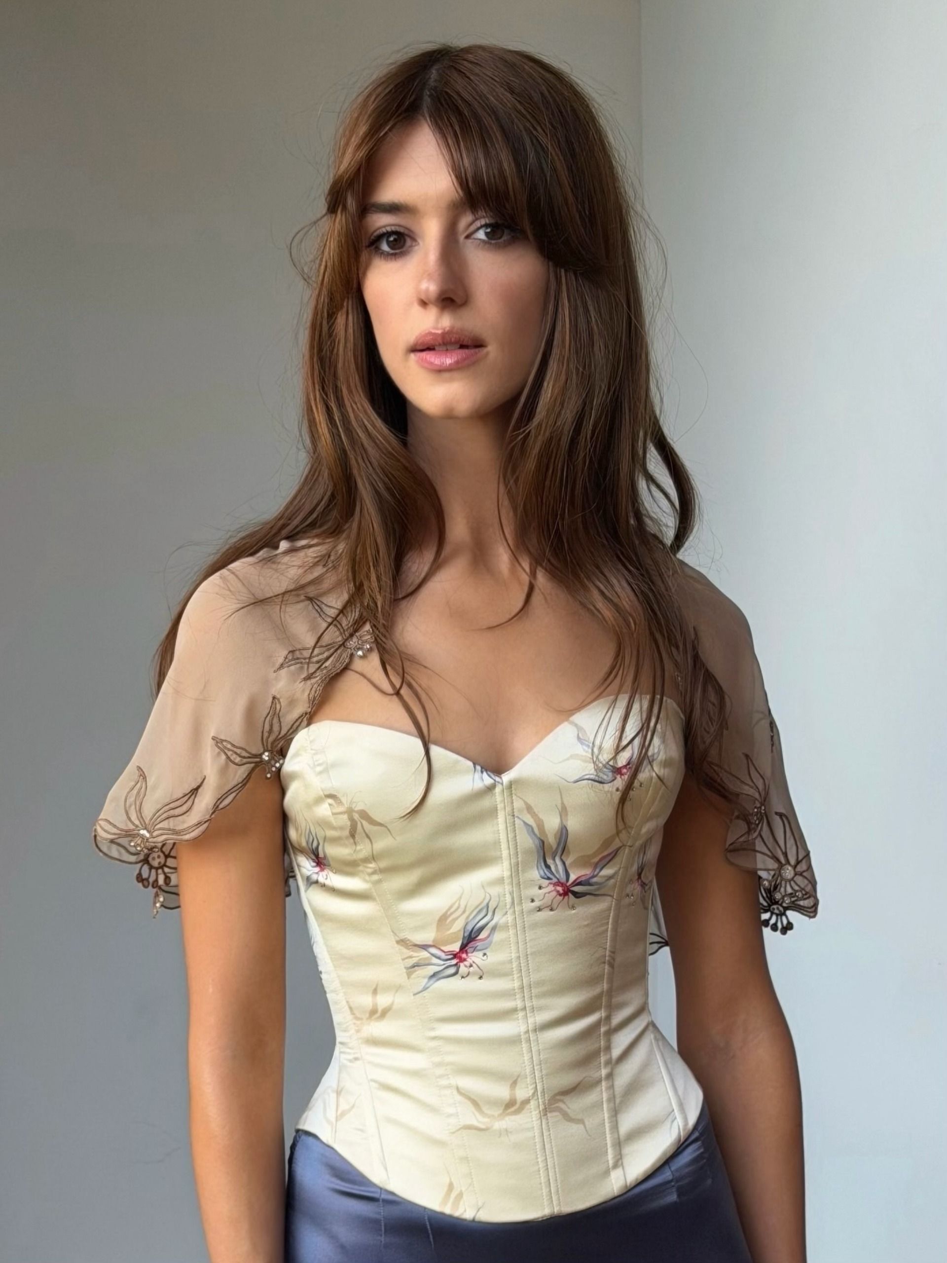 Daisy Edgar-Jones wearing a vintage Chloe corset with a tousled hairstyle