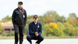 Matt Fitzpatrick and Phil Kenyon working together at the 2016 Ryder Cup
