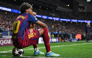Lamine Yamal of FC Barcelona sits on the ball during the UEFA Champions League 2025/26 Quarter-Final Second Leg match between Club Atl&eacute;tico de Madrid and FC Barcelona