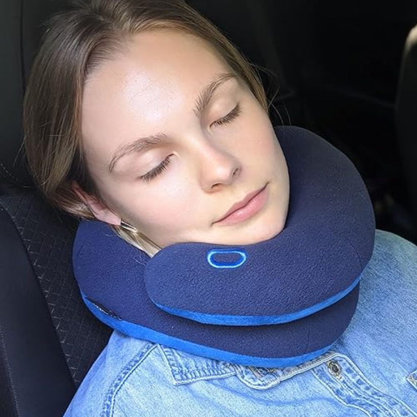 woman wearing BCOZZY travel pillow