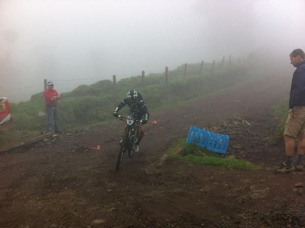 Monique Pua Mata descends off the volcano in the fog. She told Cyclingnews she could barely see to pick her line due to conditions.
