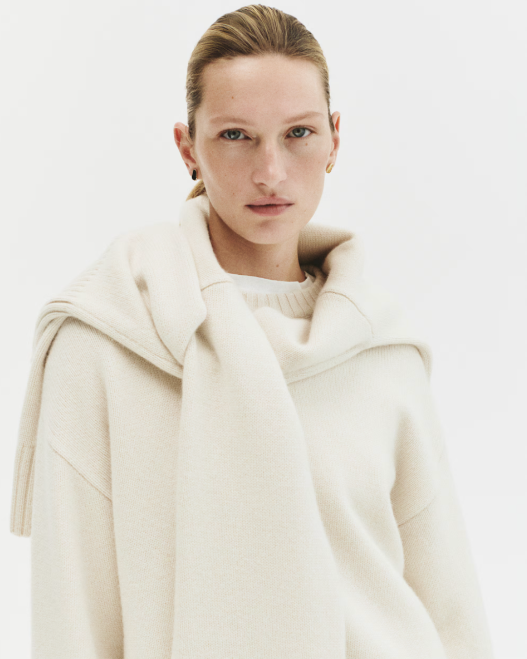 Model wearing cream cashmere jumper
