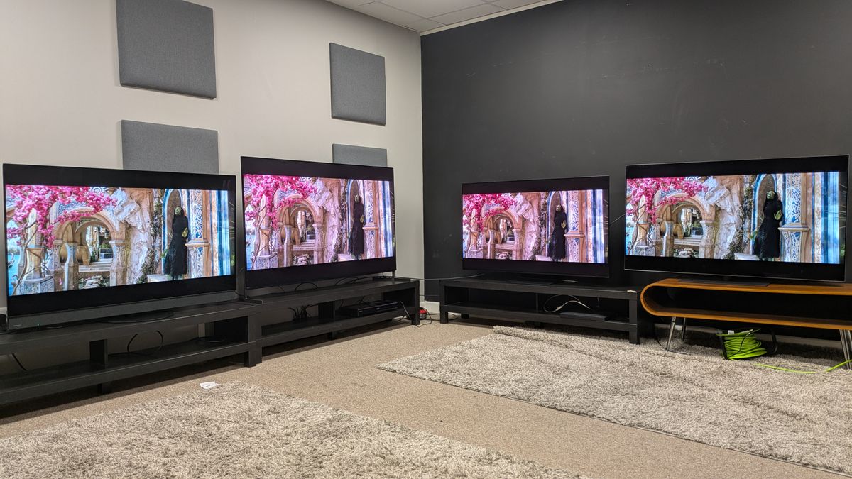 Panasonic Z95B (far left) Sony Bravia 8 II (middle left) Samsung S95F (middle right) LG G5 (far right) with Elphaba from Wicked on screen