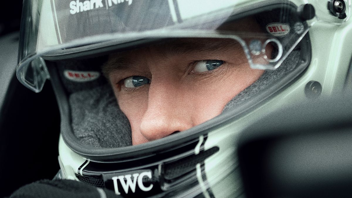 A close-up of Brad Pitt in a racing helmet in Apple&#039;s &#039;F1&#039; movie