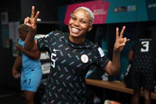 Onome Ebi of Nigeria celebrates in the dressing room after their team advanced to the knockouts during the FIFA Women's World Cup Australia & New Zealand 2023 Group B match between Ireland and Nigeria at Brisbane Stadium on July 31, 2023 in Brisbane, Australia.