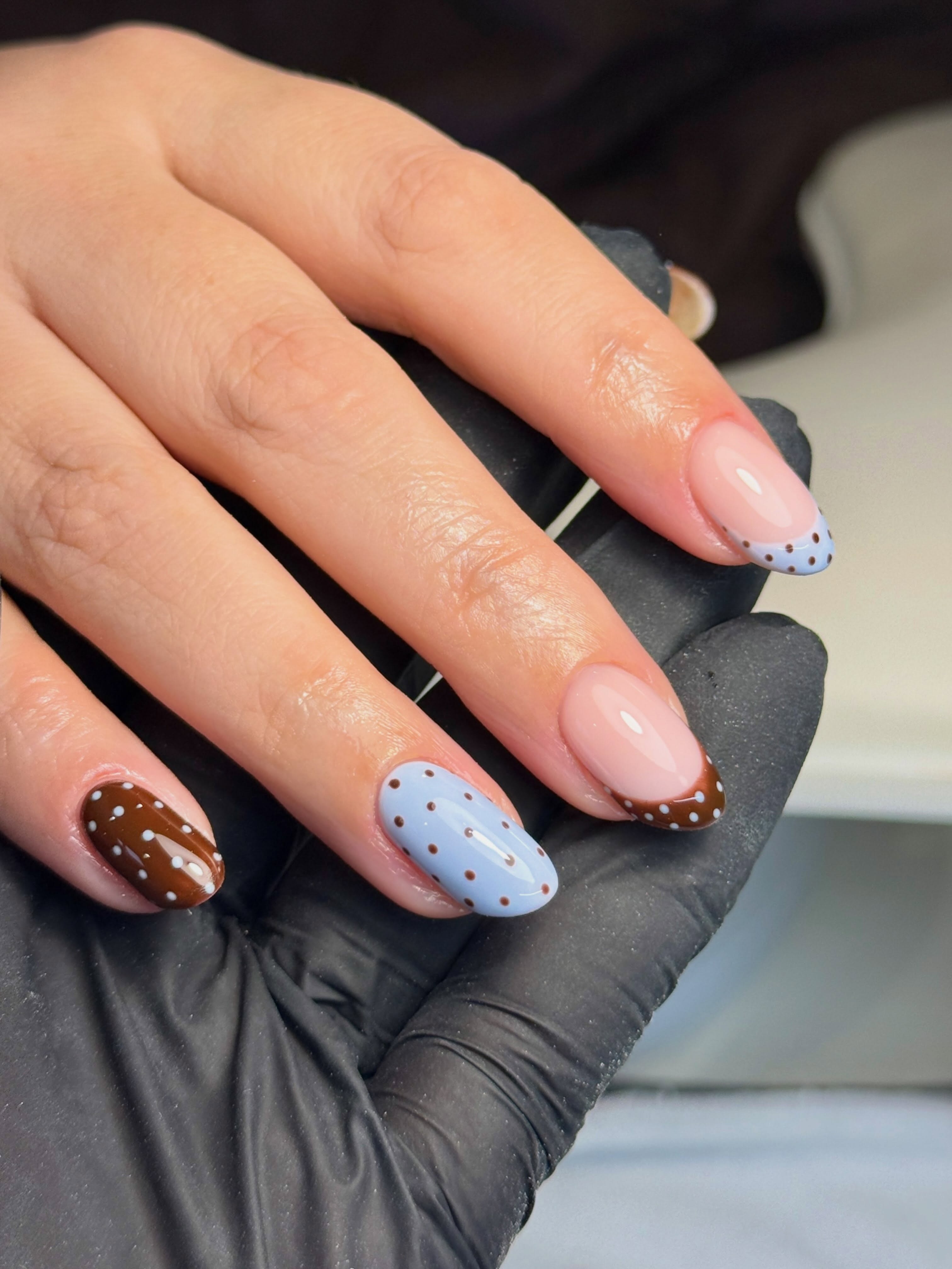 Chocolate brown and sky blue polka dot nail art