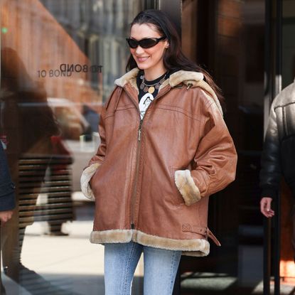 Bella Hadid wearing aviator jacket