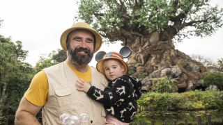 Jason Kelce and his child at Disney's Animal Kingdom