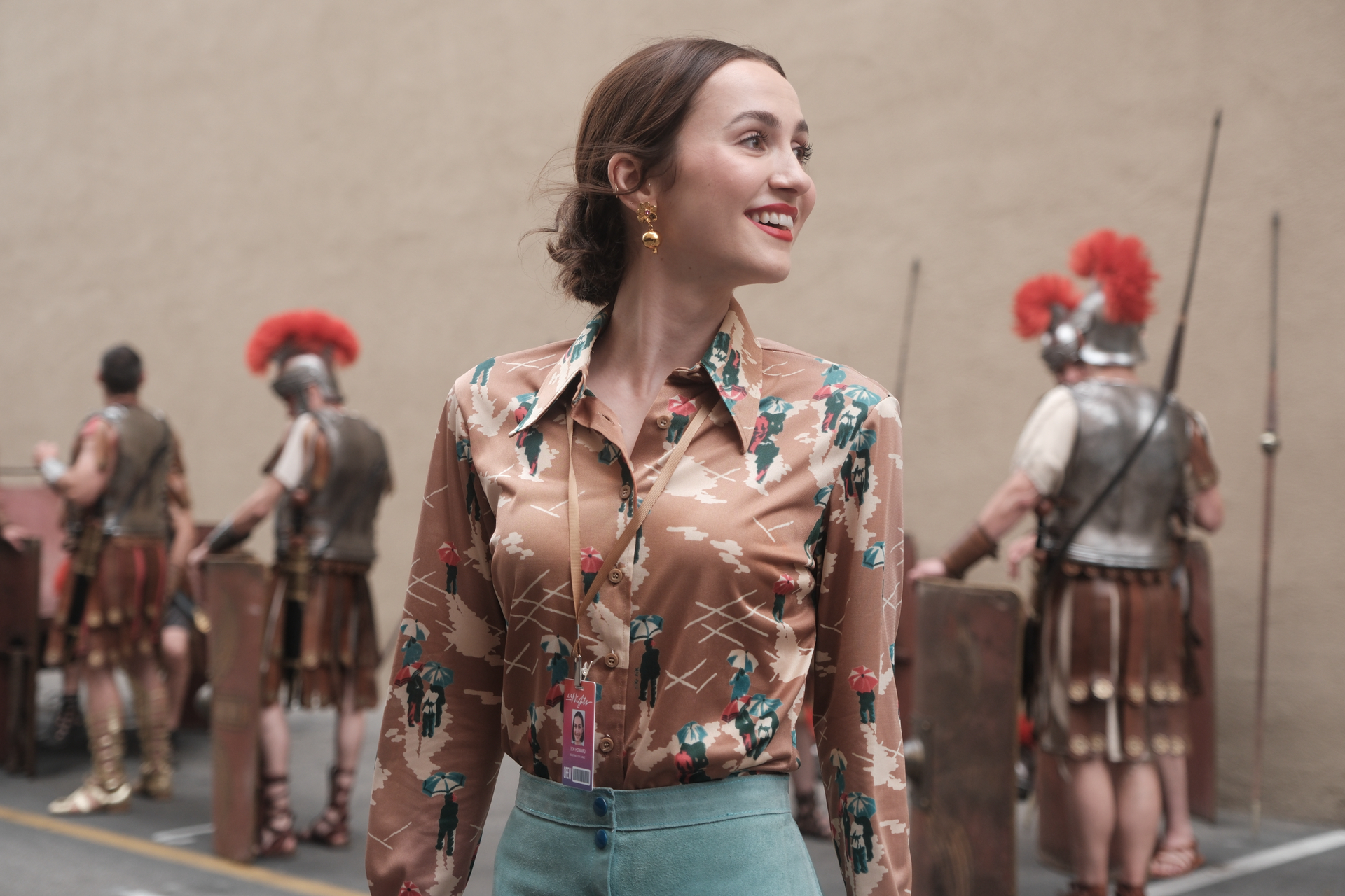 maude apatow as lexi in professional dress smiling on a hollywood lot filming a period piece movie in euphoria season 3