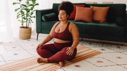 Woman doing yoga for anxiety at home
