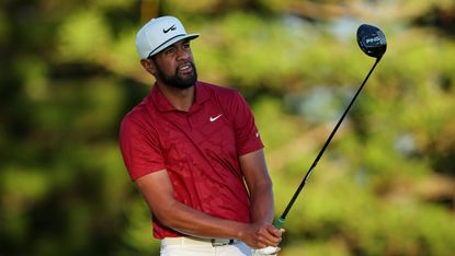 Tony Finau watches his shot after hitting a drive