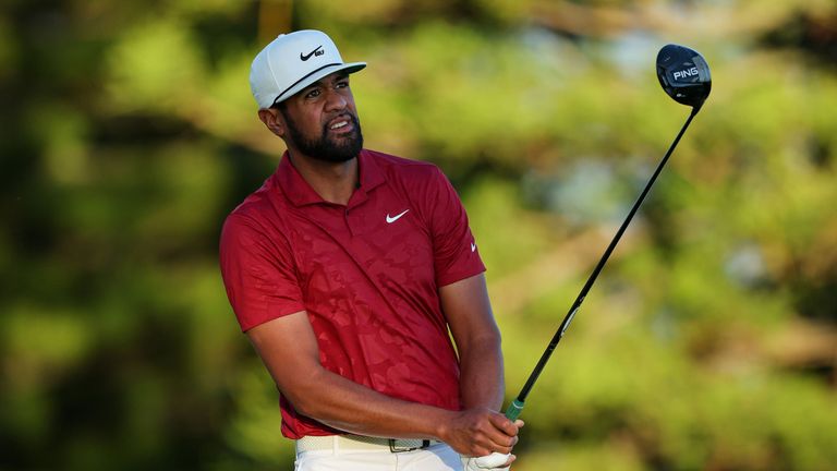 Tony Finau watches his shot after hitting a drive