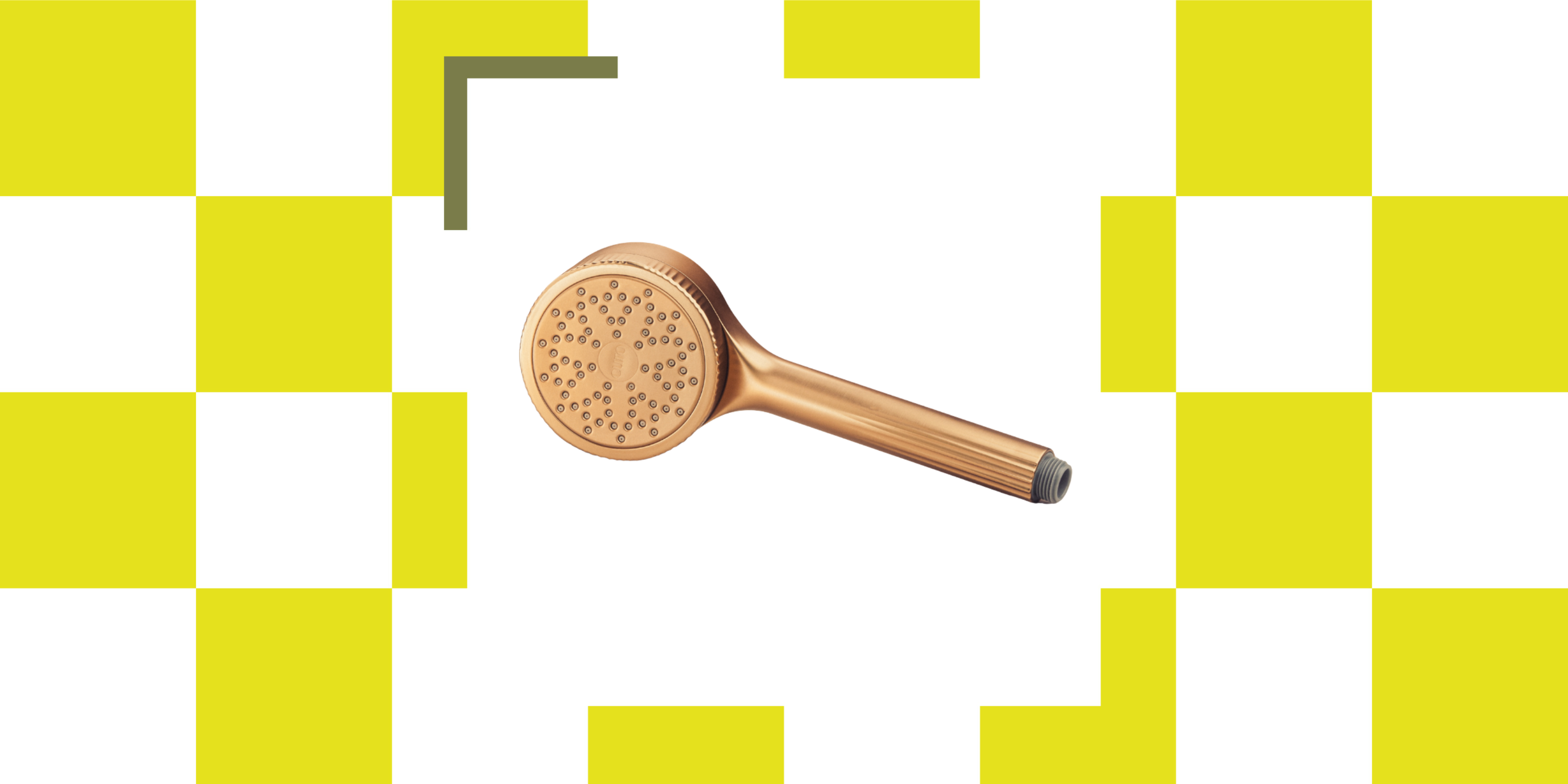 A gold filtered shower head against a neon checkerboard backdrop