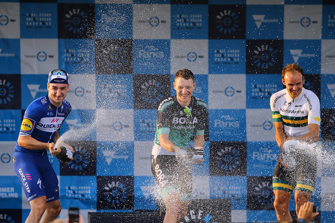 Sam Bennett sprays the champagne
