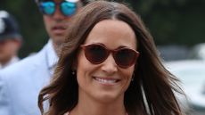  Pippa Middleton's mint green off-shoulder dress is beautiful. Seen here she attends Men's Final Day at the Wimbledon 2019 Tennis Championships