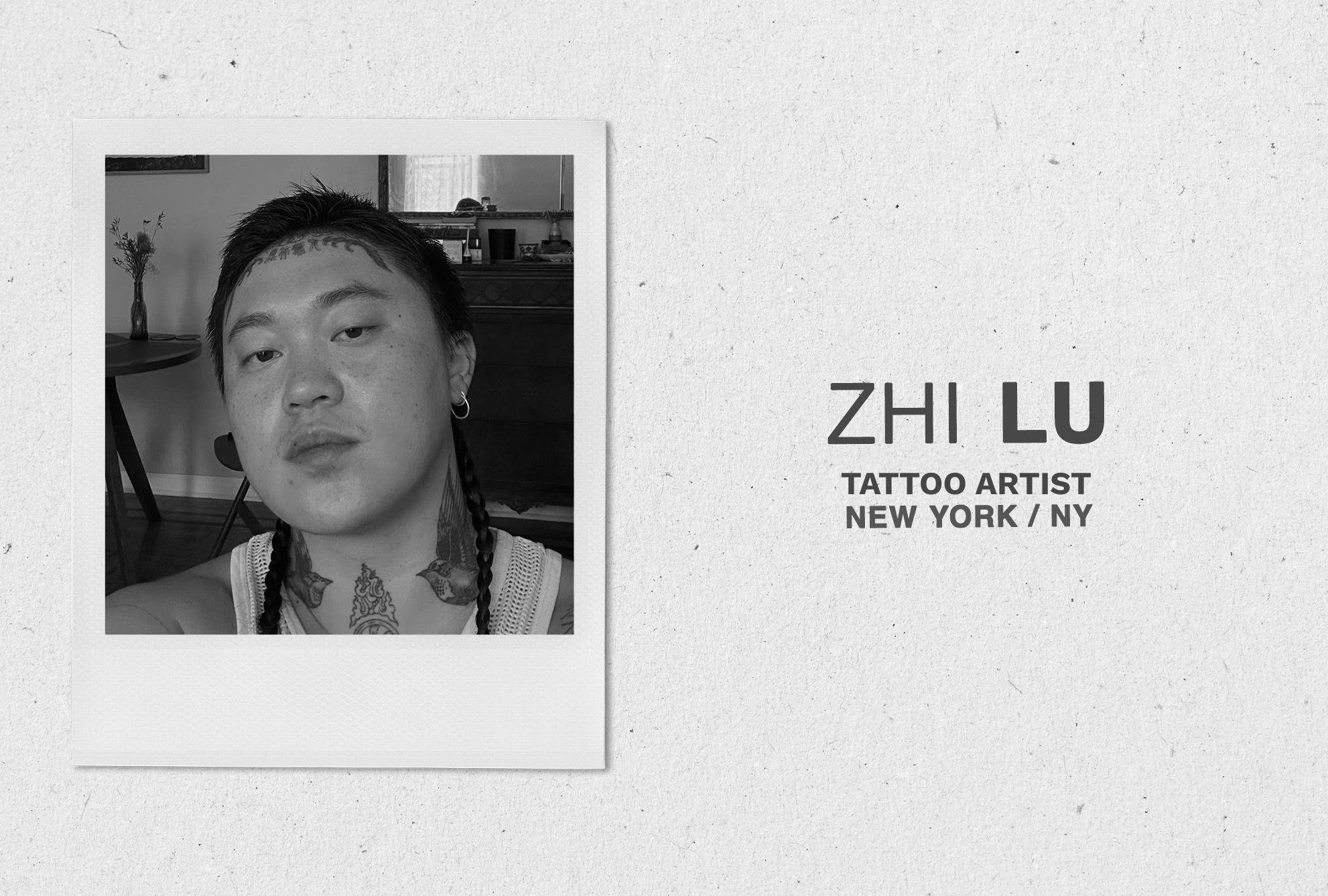 An image of New York-based tattoo artist Zhi Lu with a black and white filter.