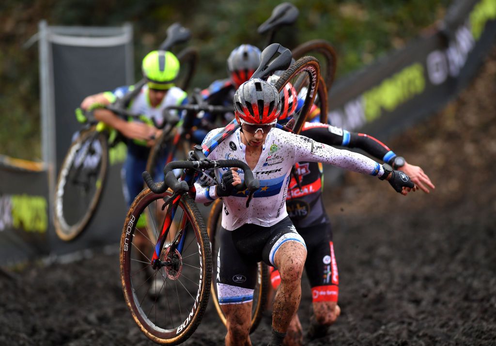 NIEL BELGIUM NOVEMBER 11 Lars Van Der Haar of The Netherlands and Team Baloise Trek Lions competes in a muddy sector during the 30th Superprestige Niel Jaarmarktcross 2021 Mens Elite SPNiel Superprestige2022 on November 11 2021 in Niel Belgium Photo by Luc ClaessenGetty Images