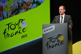 Tour de France general director Christian Prudhomme delivers a speech during the official presentation of the 2022 Tour de France cycling race in Paris on October 14 2021 Photo by AnneChristine POUJOULAT AFP Photo by ANNECHRISTINE POUJOULATAFP via Getty Images