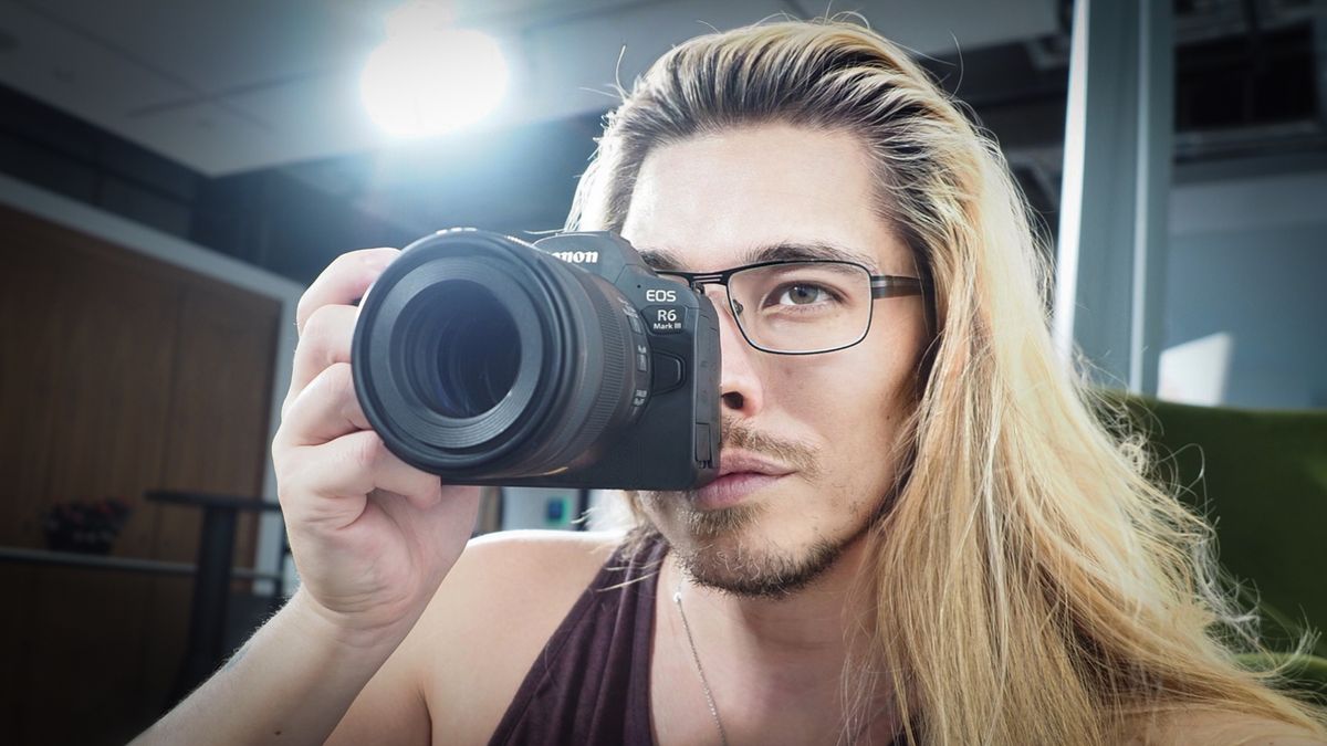 Mockup image of the Canon EOS R6 Mark III being used by photographer James Artaius