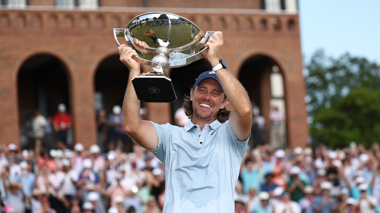 Tommy Fleetwood lifts the FedEx Cup