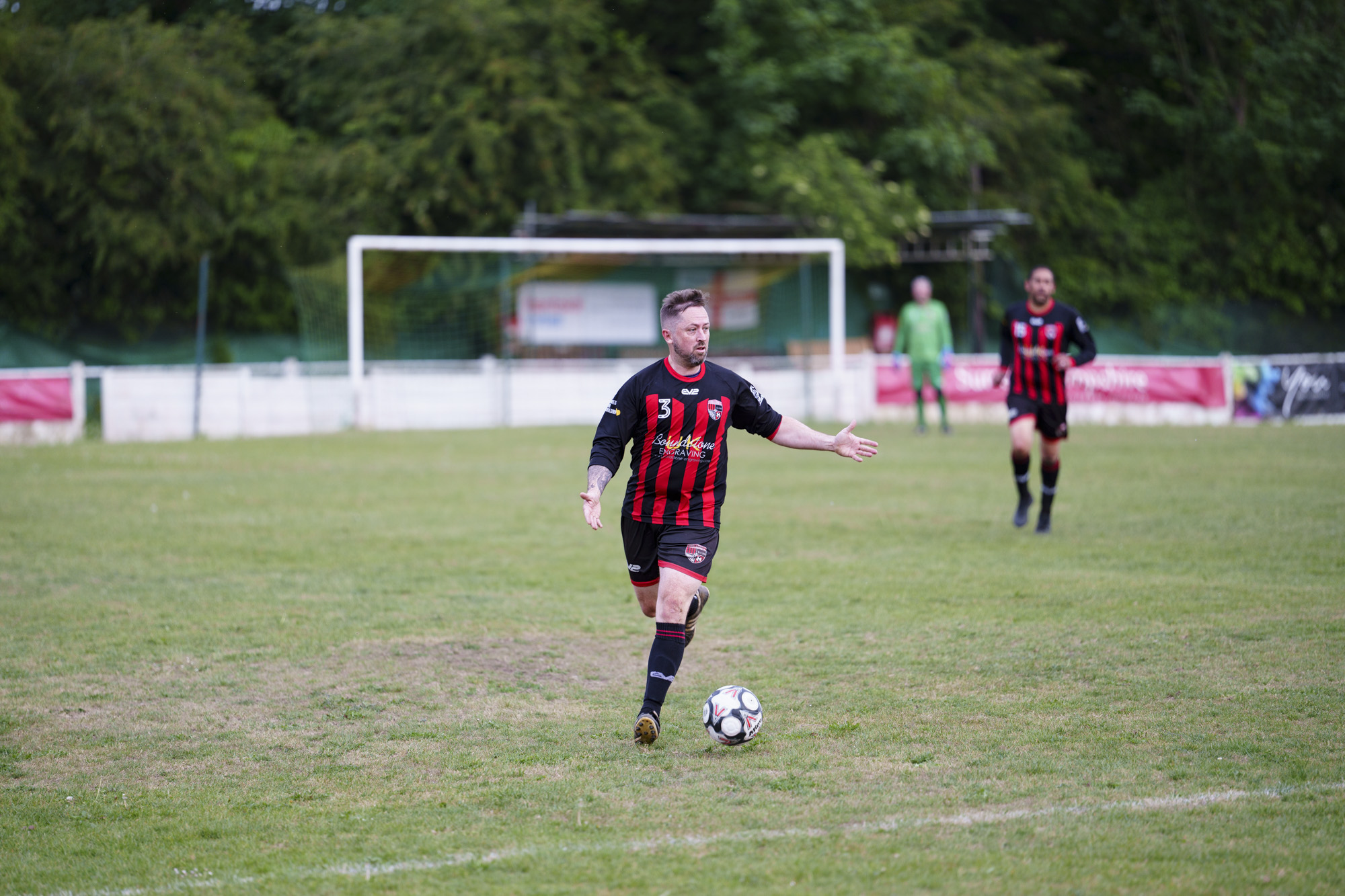 Soccer players in action, taken with the Sony FE 50-150mm F2 GM lens