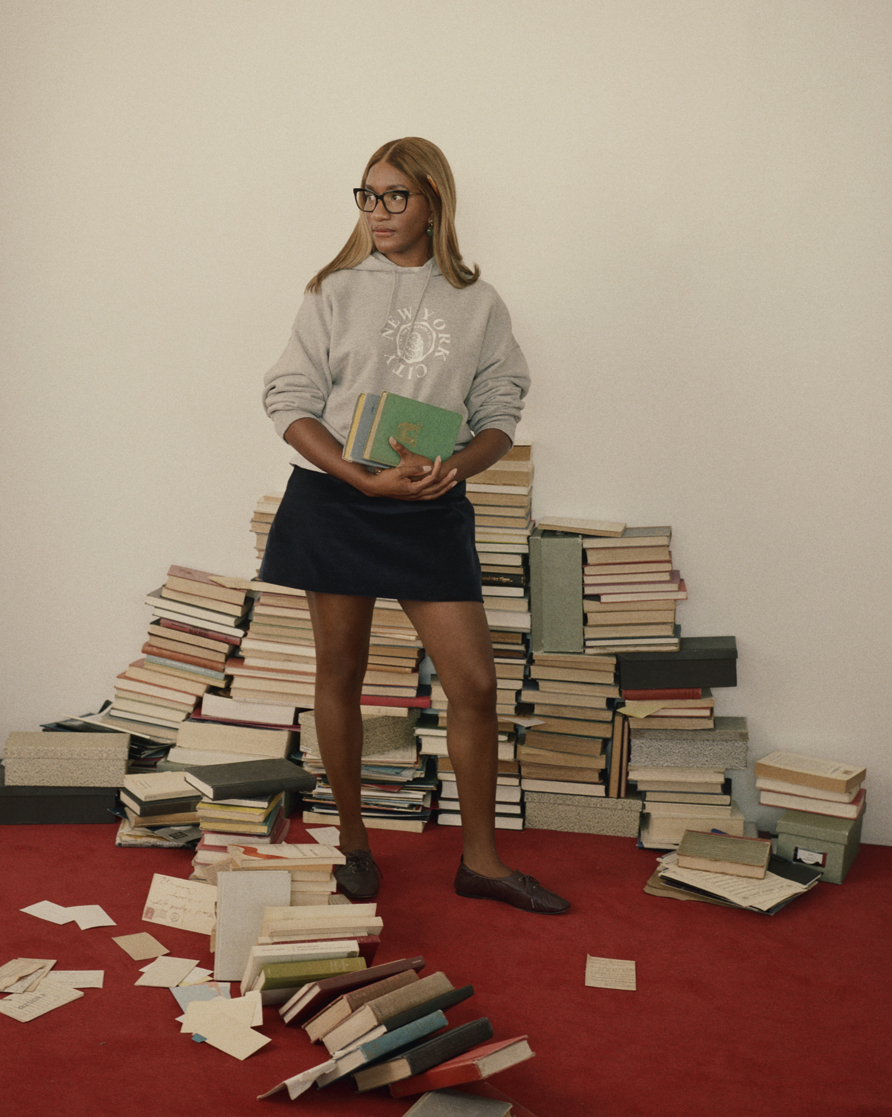 authors pose in pieces from the Madewell x New York Public Library collaboration