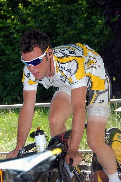 Mark Cavendish warms up under shade from the glorious Swiss sunshine.