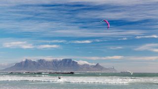 Person kite surfing in Cape Town, South Africa