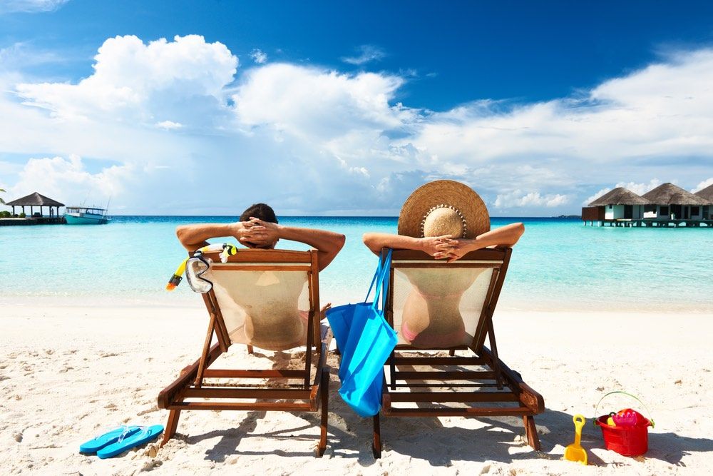 A couple on a tropical beach.