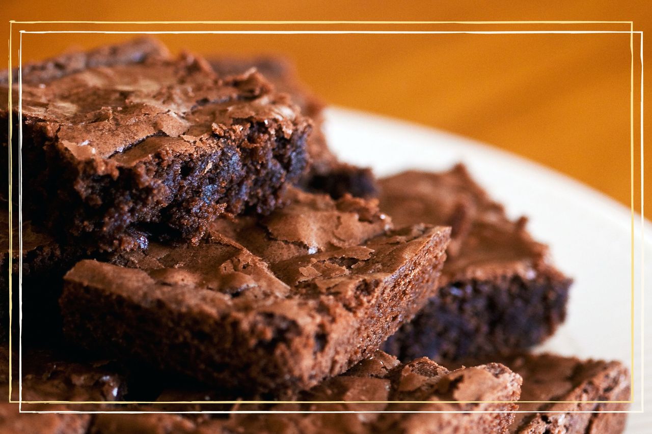 A close up of a stack of chocolate brownies