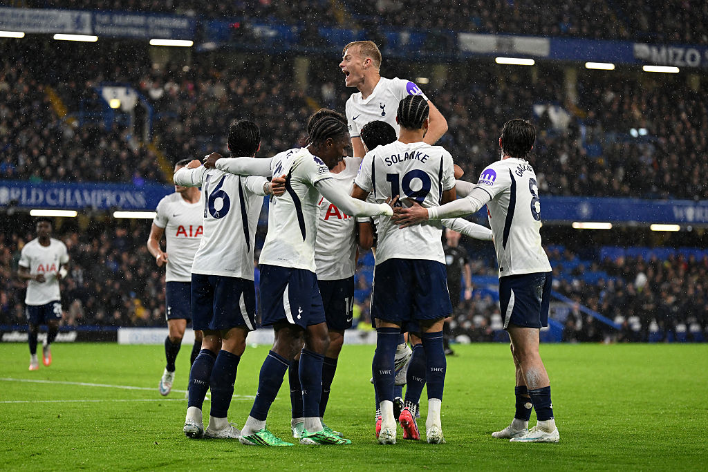 LONDON, ENGLAND - OCTOBER 24: Tottenham Hotspur players celebrate after Mike Penders of Chelsea scores an own goal, the first goal for Tottenham Hotspur during the Premier League 2026/27 match between Chelsea FC and Tottenham Hotspur at Stamford Bridge on October 24, 2026 in London, England. (Photo by Mike Hewitt/Getty Images)