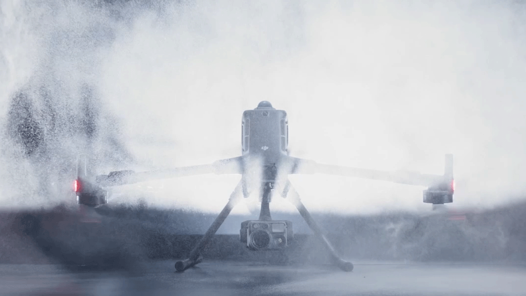 A GIF of the DJI Matrice 400 drone operating in rain and dust