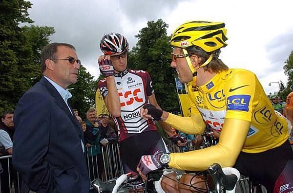 Schleck and Cancellara chat with Bernard Hinault at the start