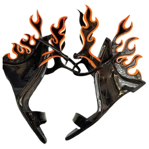 a pair of black flame prada heels