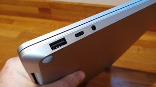 Microsoft Surface Laptop 5 review; a person holds a laptop