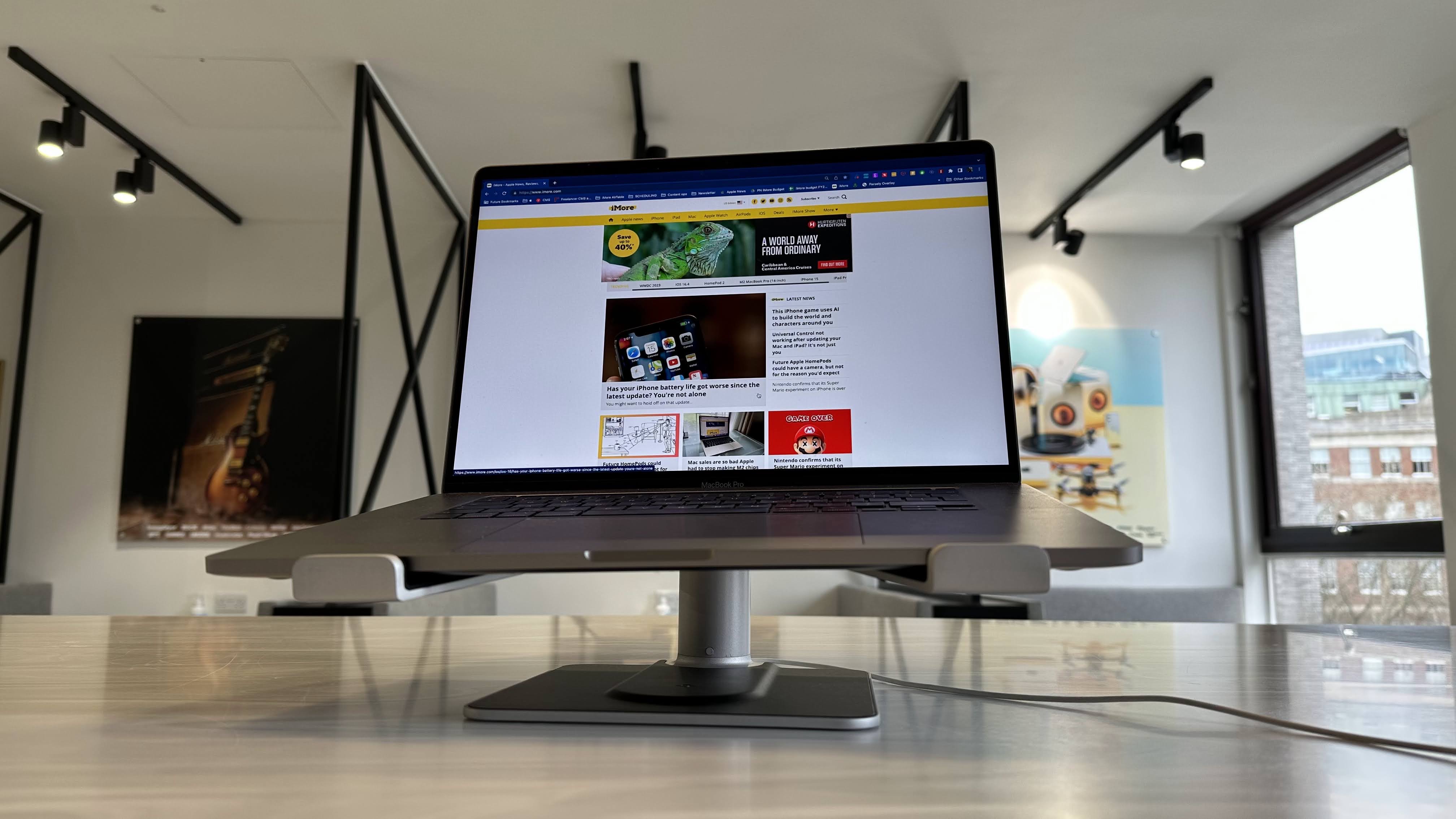 Twelve South HiRise Pro MacBook stand on a marble surface in an office