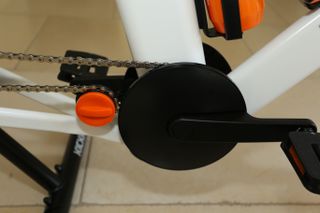 A chZwift Ride features a chainhook which allows the frame to be stowed when not on the trainer